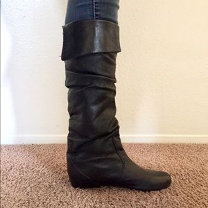 Calf height black leather boots